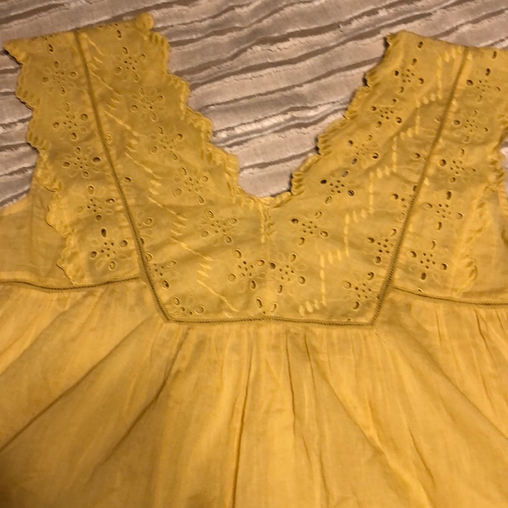 Yellow peplum top